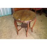 An Edwardian mahogany occasional table