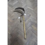 A 19th Century wood handle small scythe plus one other