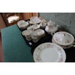 A large selection of Paragon china Victoriana Rose dinner and tea wares, dinner plates, tureen,