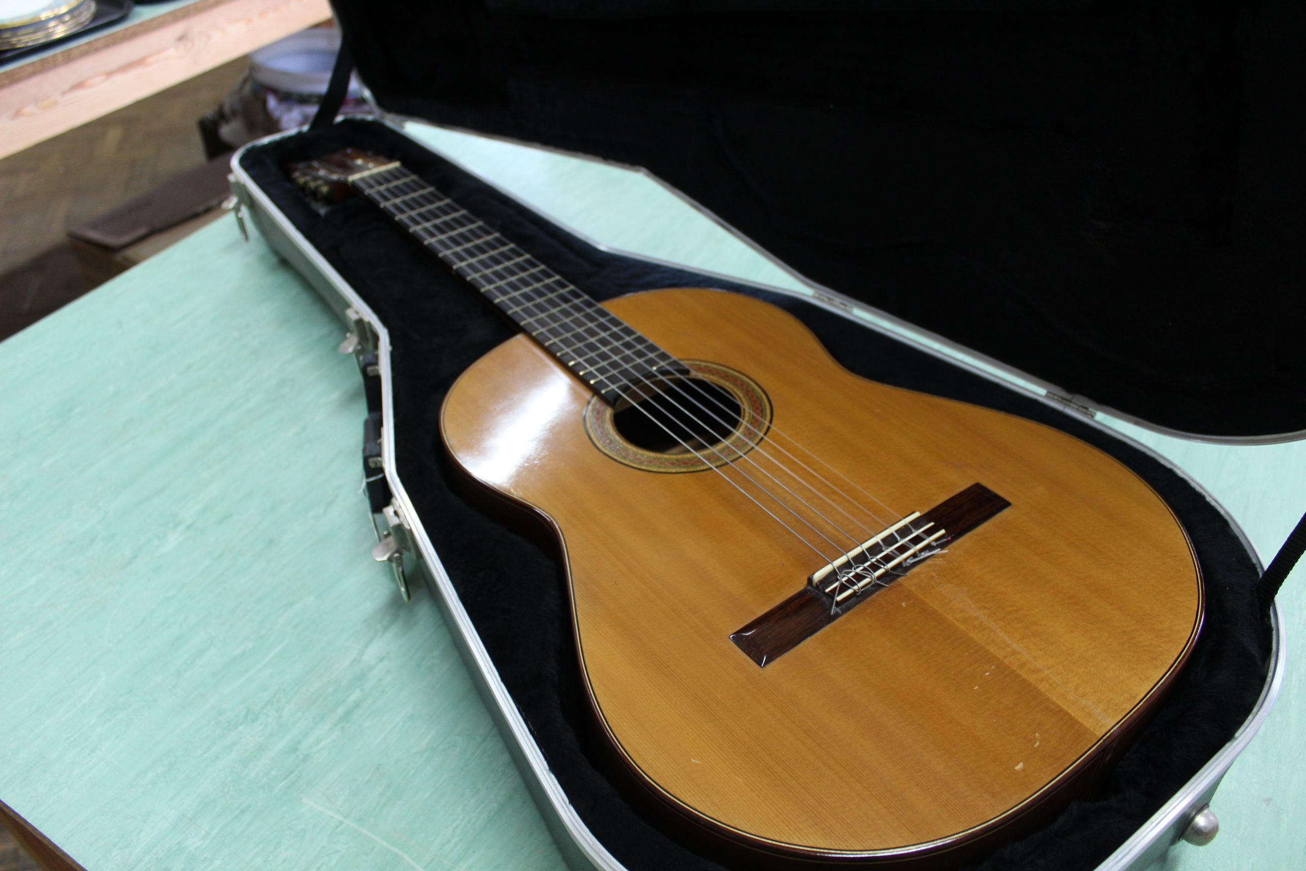 A classical guitar by A A Jones of Norwich, bears white label, dated Aug '82 in rosewood and spruce,