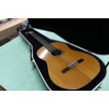 A classical guitar by A A Jones of Norwich, bears white label, dated Aug '82 in rosewood and spruce,