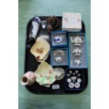 A tray with miniature Coalport cups and saucers, a German Peter Rabbit tea set,