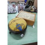 A wooden sewing box with tapestry top together with an upholstered top foot stool