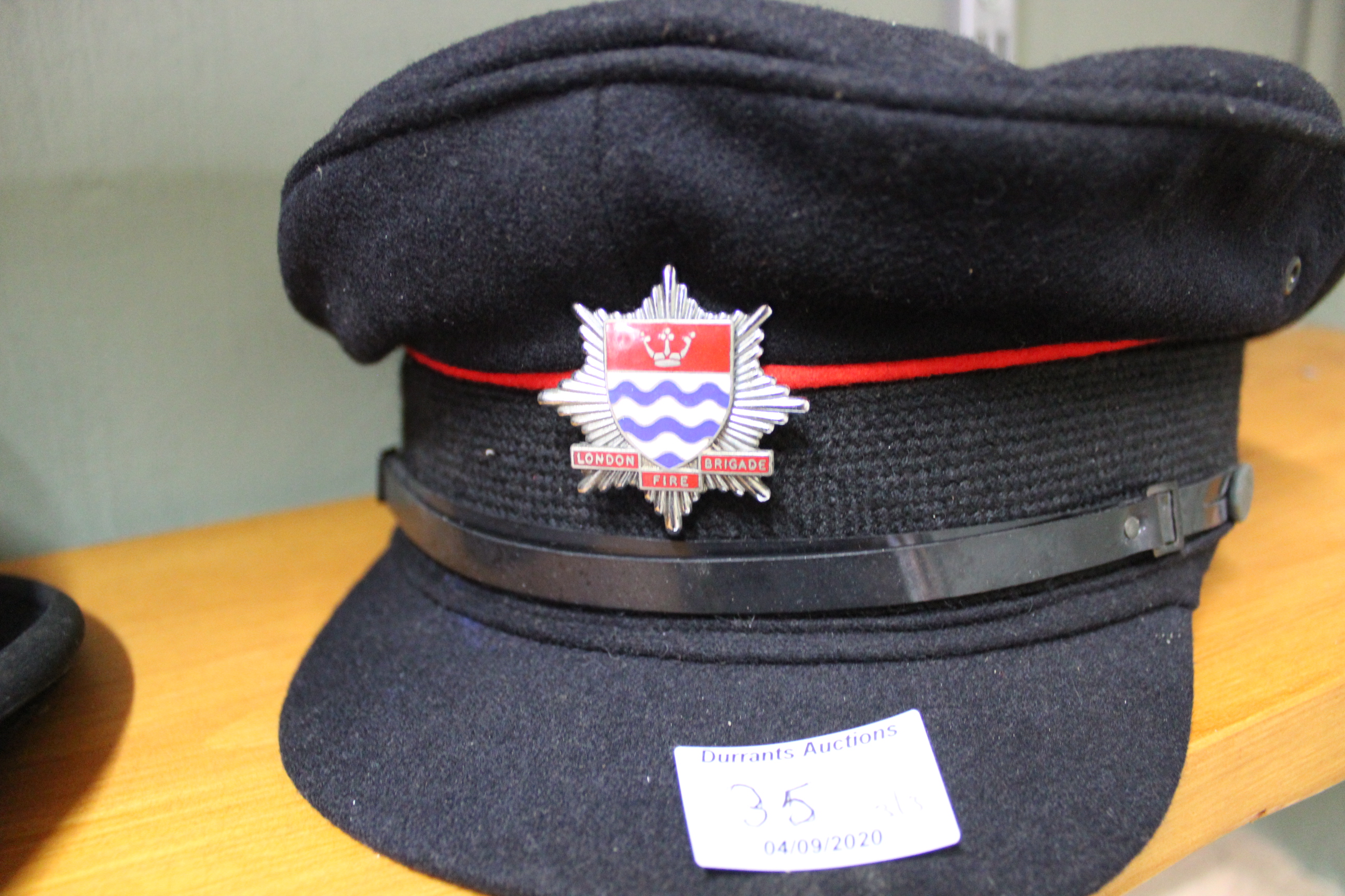 A London Fire Brigade hat plus a bowler and brown leather Australian style hat - Image 3 of 4