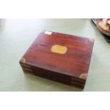 A mid 19th Century mahogany brass bound stationary box with inset handles,