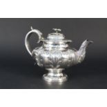 A highly decorative Victorian silver teapot (dent to main body), hallmarked London 1855,