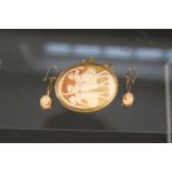 A 9ct gold mounted cameo brooch depicting three Graces (some cracks) together with a pair of 9ct