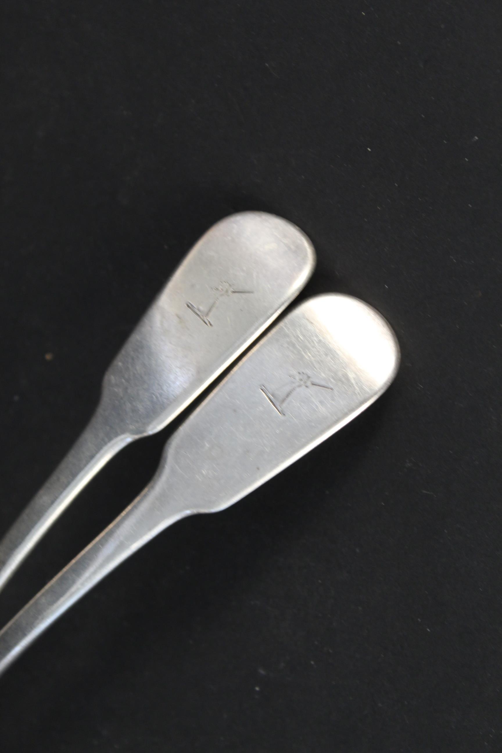 A pair of Georgian silver ladles with crested handles, - Image 2 of 3