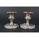 A pair of silver candlesticks, Birmingham 1906,