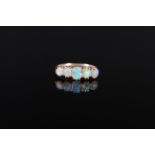 An 18ct gold opal set five stone ring (two opals are as found), size L 1/2,