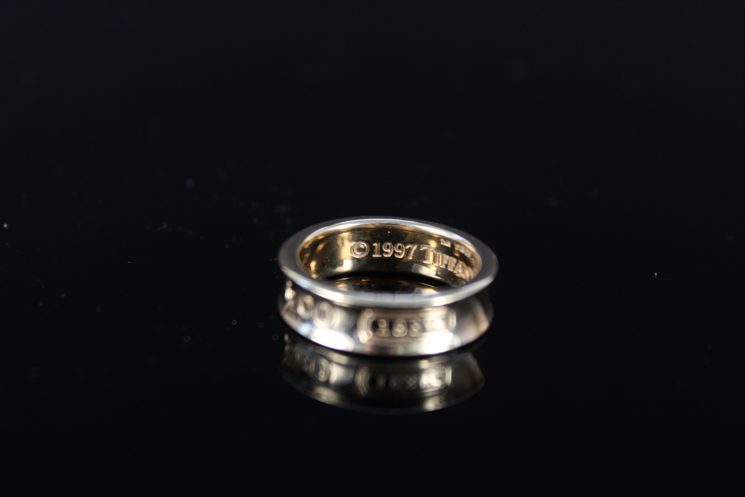 An 18ct gold Tiffany & Co 1837 band ring, size N, - Image 3 of 3