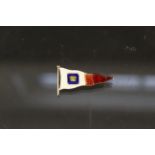 A 9ct gold enamelled flag brooch (as found),