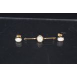 A 9ct gold opal set bar brooch plus a pair of similar earrings, approx 3.