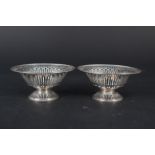 A pair of pierced silver bon bon dishes, Birmingham 1912 by E J Houlston,