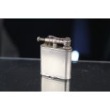 A silver plated Dunhill lighter, Pat No.