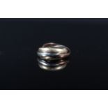 A 9ct gold tri colour interlocking band ring, size J 1/2, approx 3.