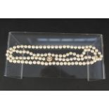 A cultured pearl necklace with 9ct gold pearl set clasp