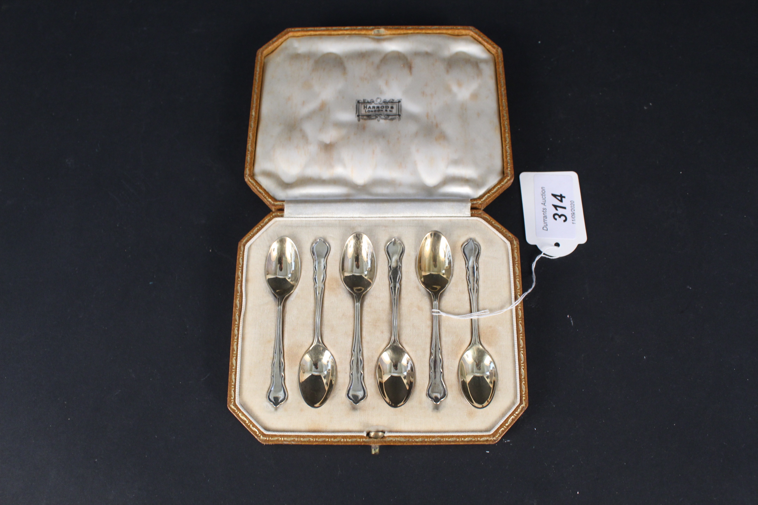 A boxed set of Harrods silver gilt coffee spoons, - Image 2 of 3