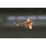 A 14ct gold insect fly brooch set with rubies and diamond,