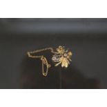 A 14ct gold insect fly brooch set with sapphires and diamonds,