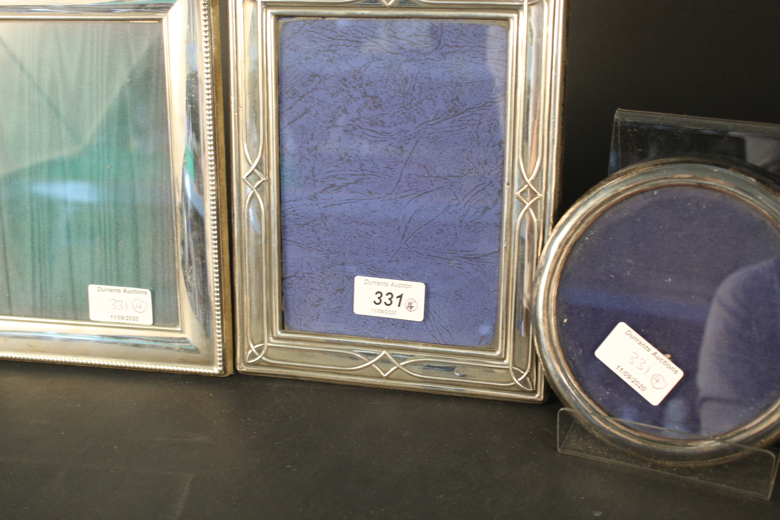 A large silver photograph frame with ribbed edge detail, - Image 3 of 3