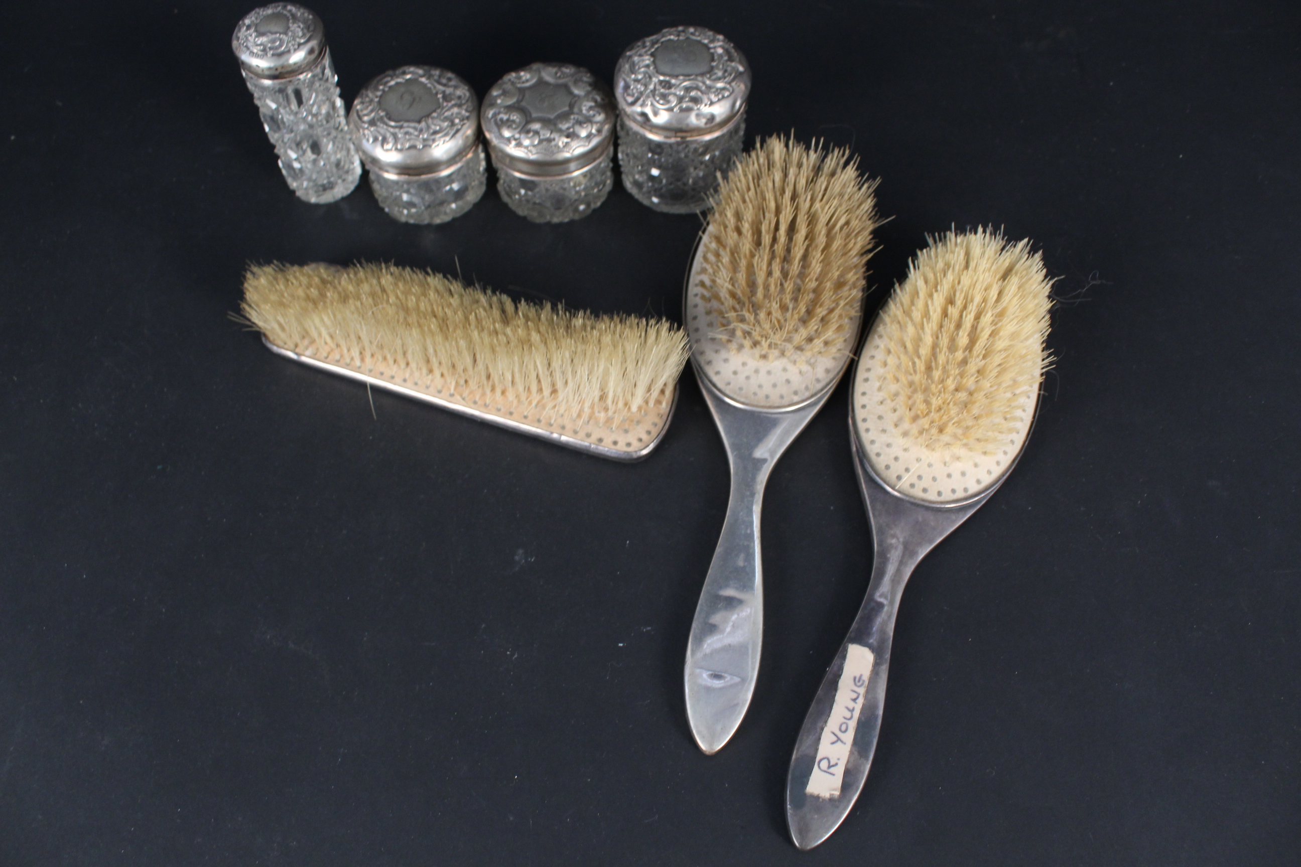 Four cut glass silver lidded dressing table jars and three silver backed brushes - Image 3 of 3