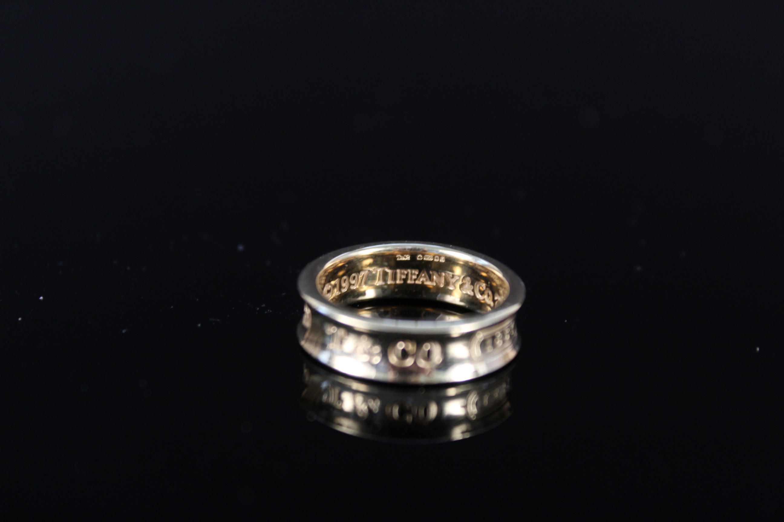 An 18ct gold Tiffany & Co 1837 band ring, size N, - Image 2 of 3
