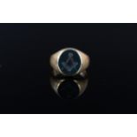 An 18ct gold signet ring set with bloodstone engraved with Masonic insignia, size N,