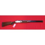 A Browning 325/SP1 over and under 12 bore shotgun with 28" multichoke barrels,