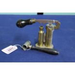 A 12 bore brass de-capper/capper re-loading tool with a fine powder measure by G & J.W.