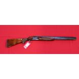 A 'Winchester 101' over and under 12 bore shotgun with 26" barrels having clean bore,