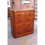 A late Victorian pine five drawer chest