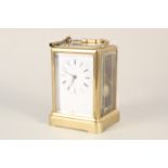 A late 19th Century French brass chiming carriage clock marked Aiguilles on reverse, with key,