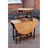 An oak gate leg dining table and oak coffee table