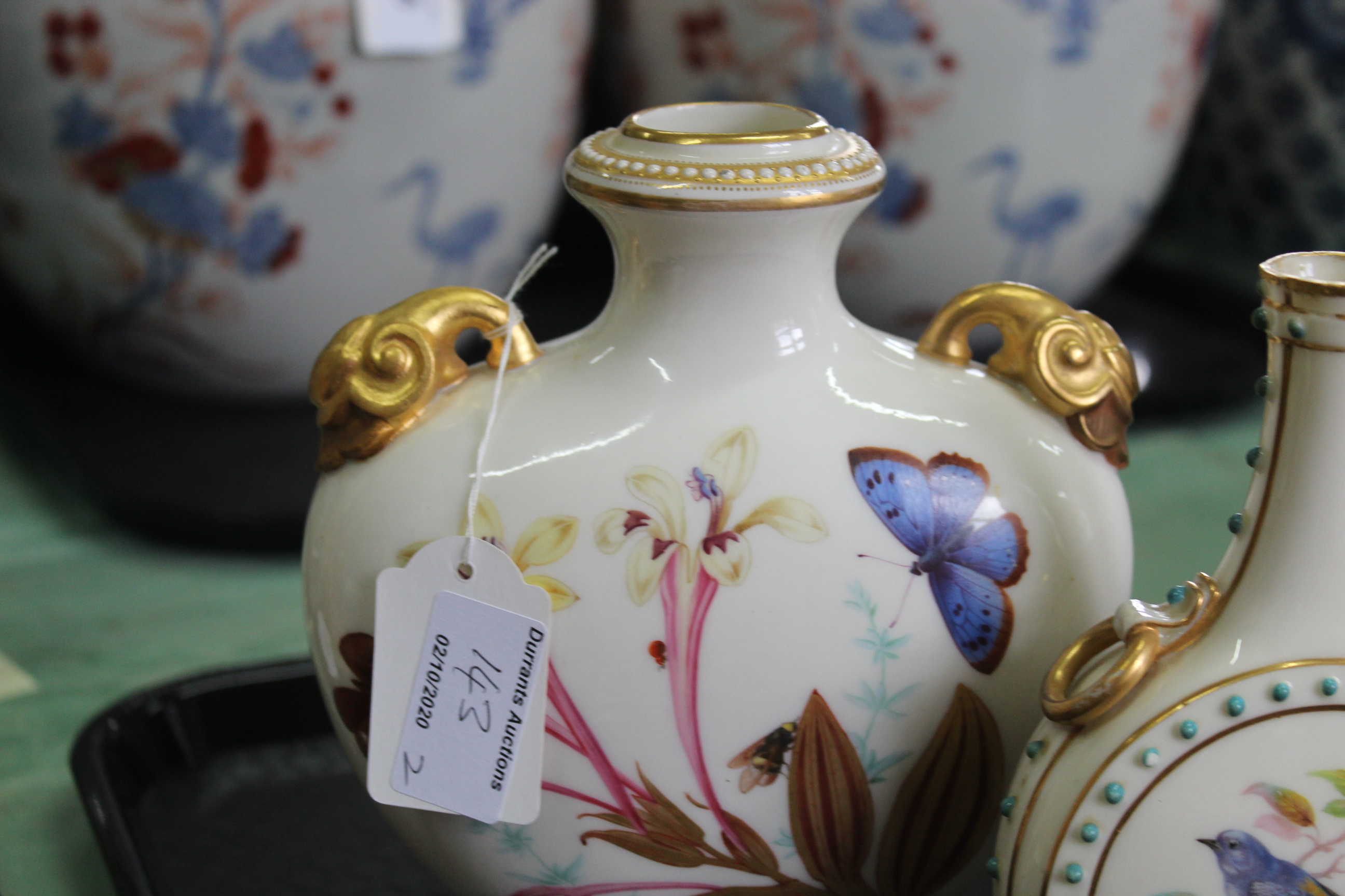 Two Worcester flask vases, one with bird portraits, the other with butterflies and flowers, - Image 2 of 3