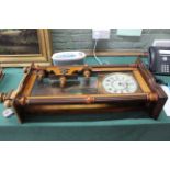 A late 19th Century walnut cased Vienna wall clock