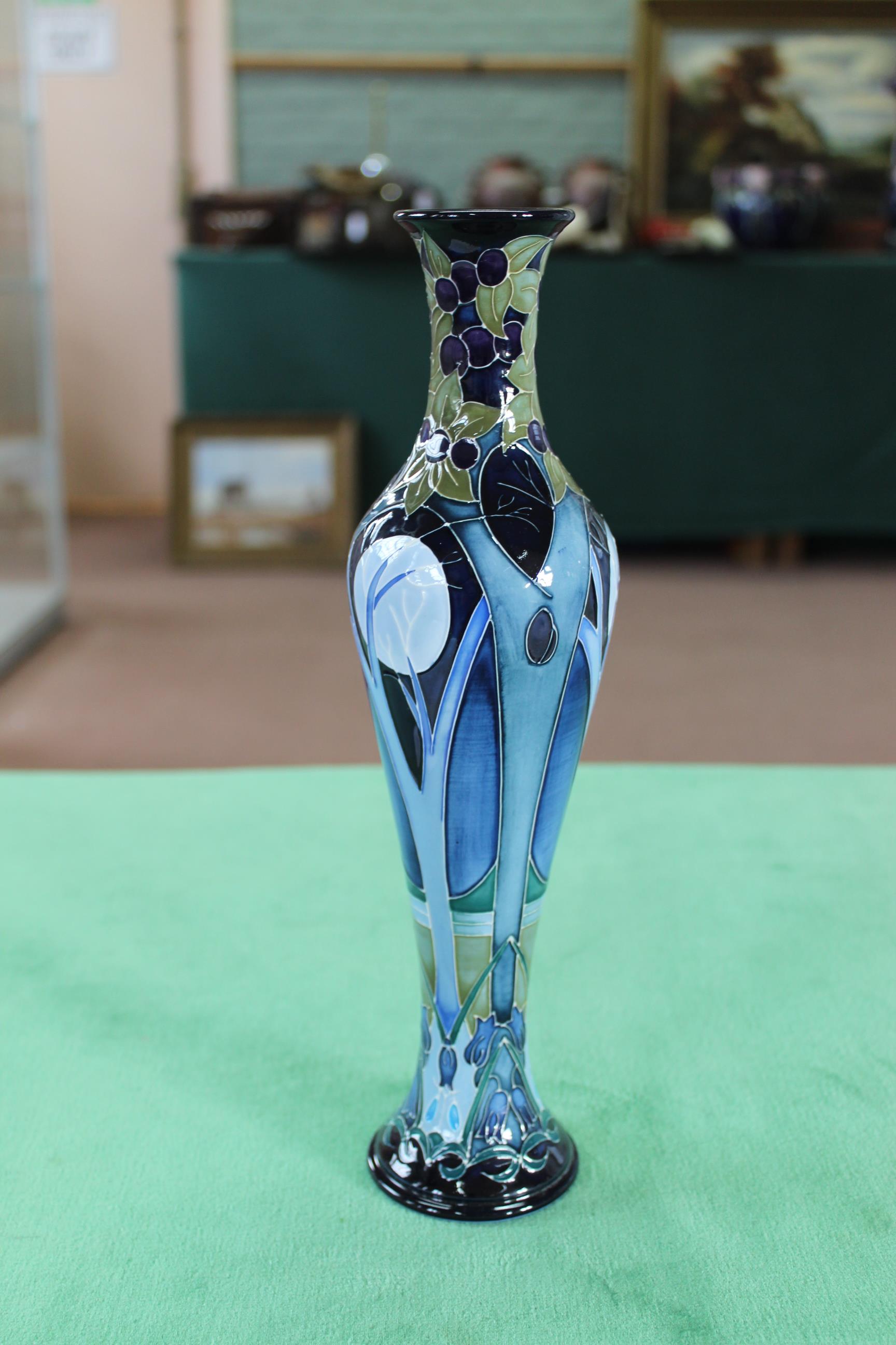 A Moorcroft 'Broomy Wood' pattern vase, 2012 by R Bishop, limited edition 21/150, 12 1/4" tall,