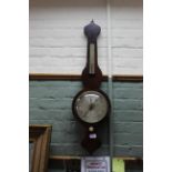 A 19th Century onion shaped rosewood banjo barometer