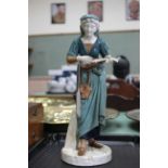 A Worcester porcelain figure of a mandolin player, signed 'Hadley', no marks to base,