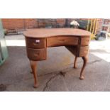 A French 19th Century walnut kidney desk