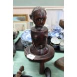 An East African carved tribal figure,