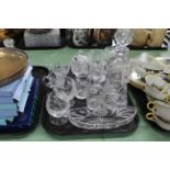 A set of sunflower design glassware including six sherry glasses, decanter,