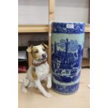 A composition model of a Jack Russell and a blue and white stick stand