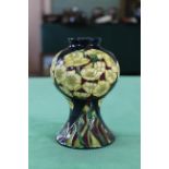 A Moorcroft 'Buttercup' pattern vase, 2009 by Paul Hilditch, limited edition 19/50, 6 1/2" high,
