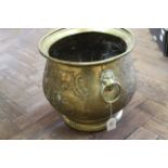 A heavy 19th Century circular punch decorated brass jardiniere,