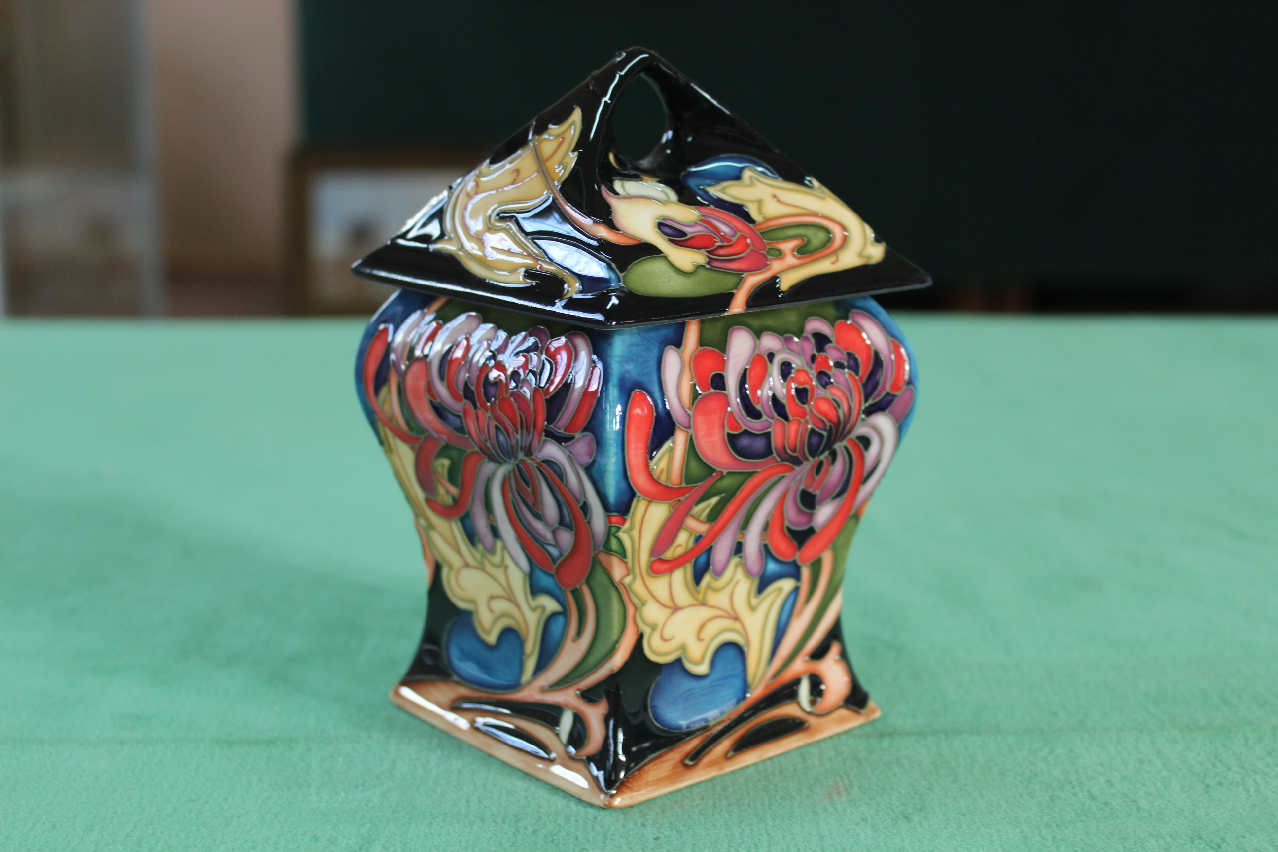 A Moorcroft 'Flower Box' lidded vase, 2008 by E Bossons, limited edition 43/100, 6 1/2" high,