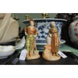A pair of c1900 Royal Worcester figures of a gardener and a water carrier,