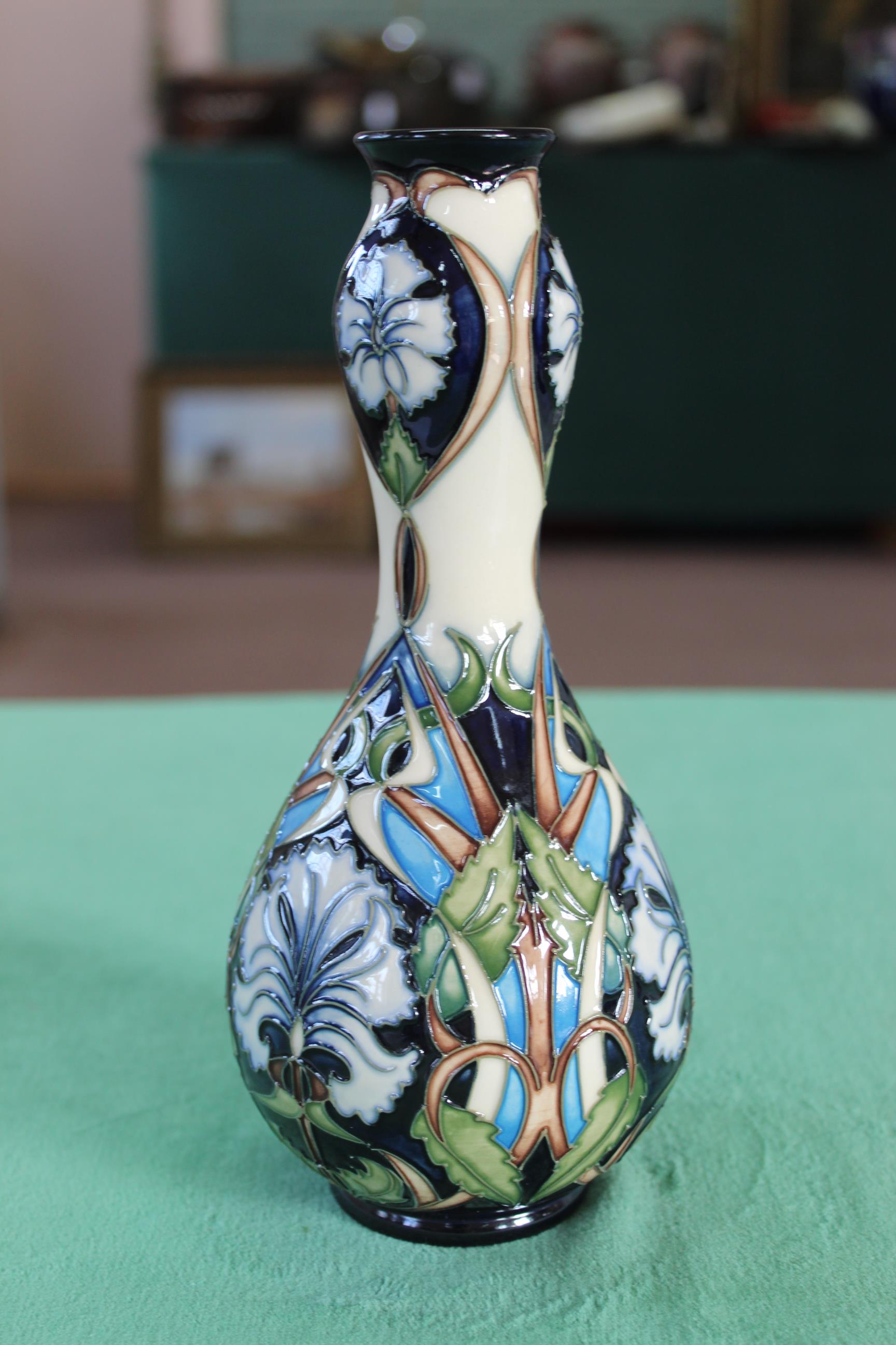 A Moorcroft 'Centaurea' pattern vase, 2004, members club piece by R Bishop, 9" high,