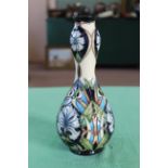 A Moorcroft 'Centaurea' pattern vase, 2004, members club piece by R Bishop, 9" high,