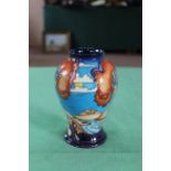 A Moorcroft 'Wanderers Sky' pattern vase, 2002 by Emma Bosson, 6" high,